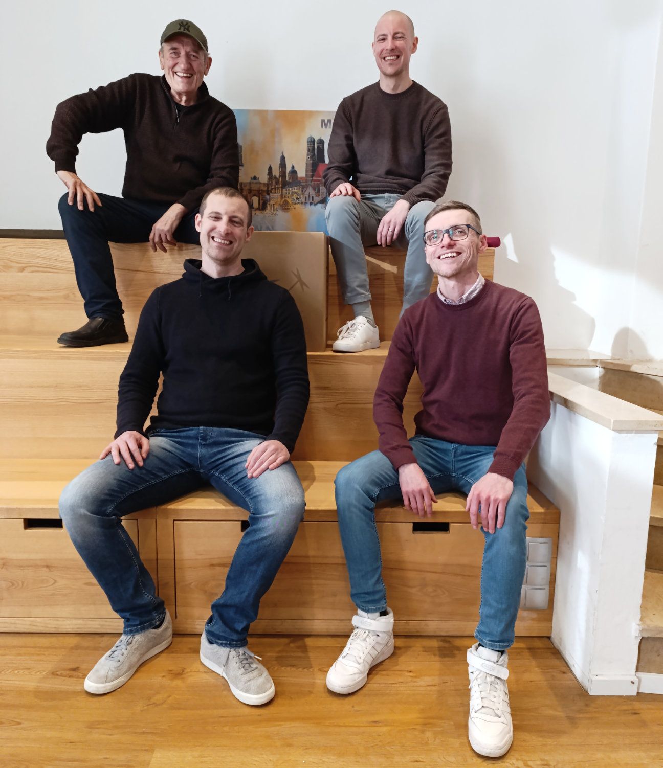 Teamfoto zeigt die Mitglieder der Firma